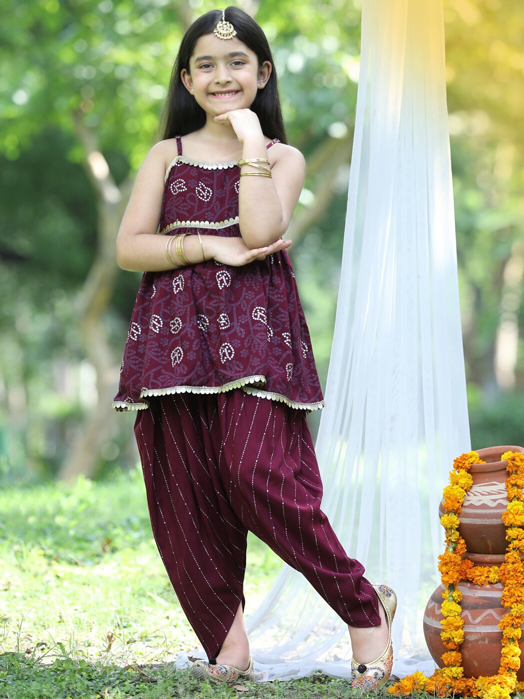 

Cutiekins Girls Purple & Golden Printed Peplum Top & Dhoti Set