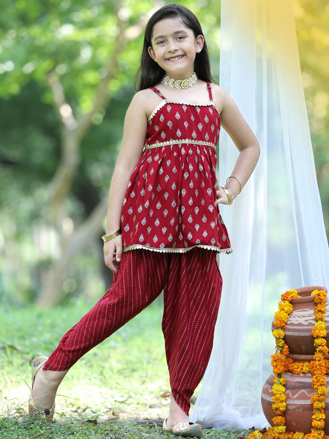 

Cutiekins Girls Maroon Ethnic Motifs Printed Kurti with Dhoti Pant