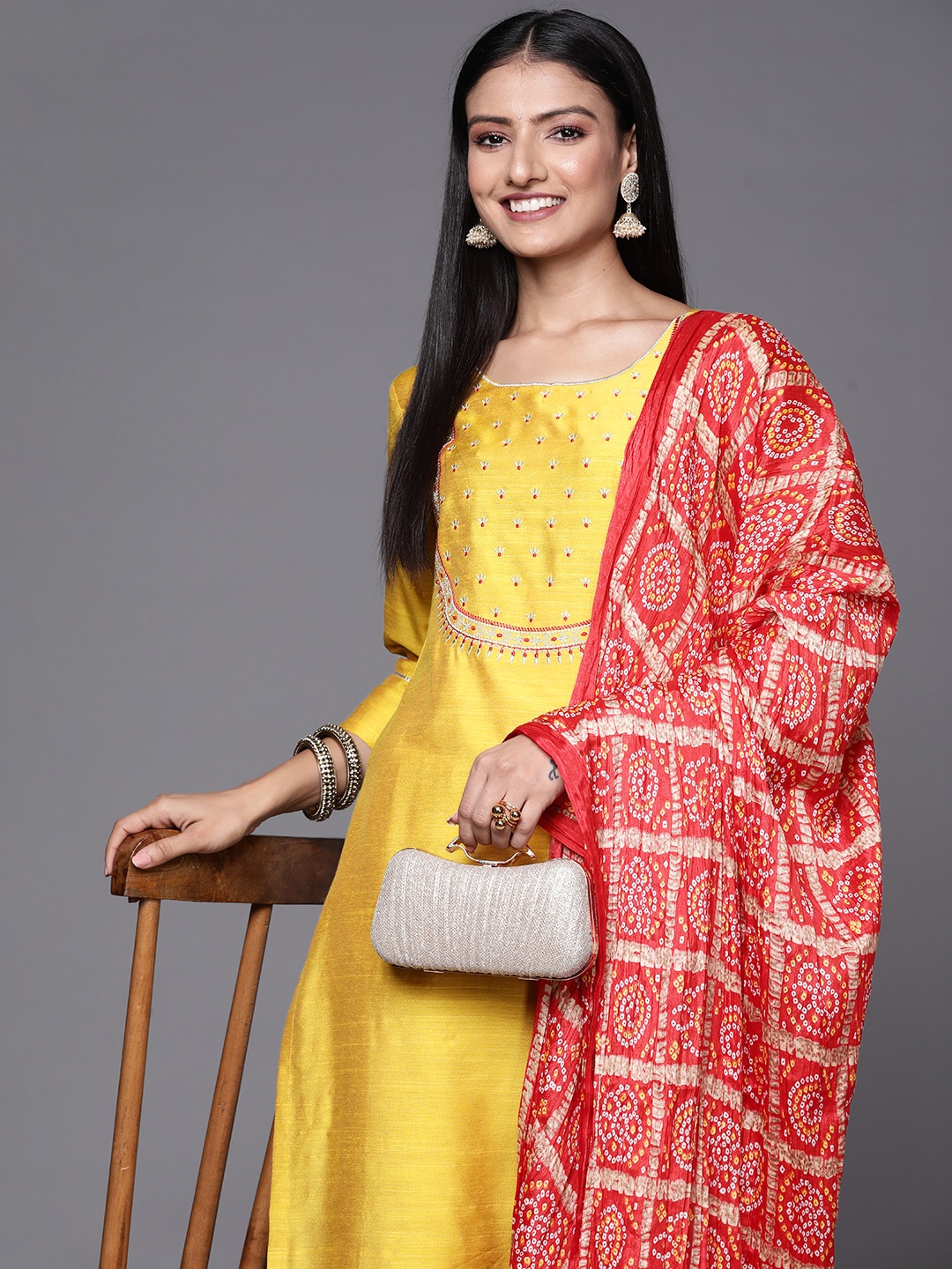 

Varanga Women Mustard Yellow Ethnic Motifs Embroidered Kurta with Trousers & With Dupatta