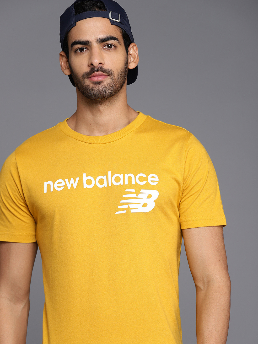 

New Balance Men Yellow & White Classic Core Brand Logo T-shirt