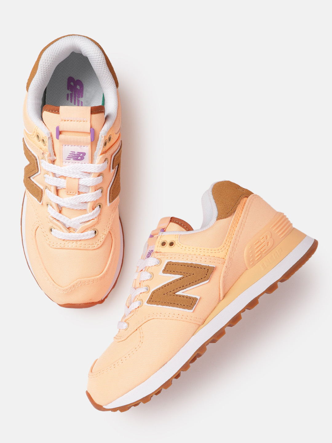 

New Balance Women Orange Solid 574 Sports Shoes