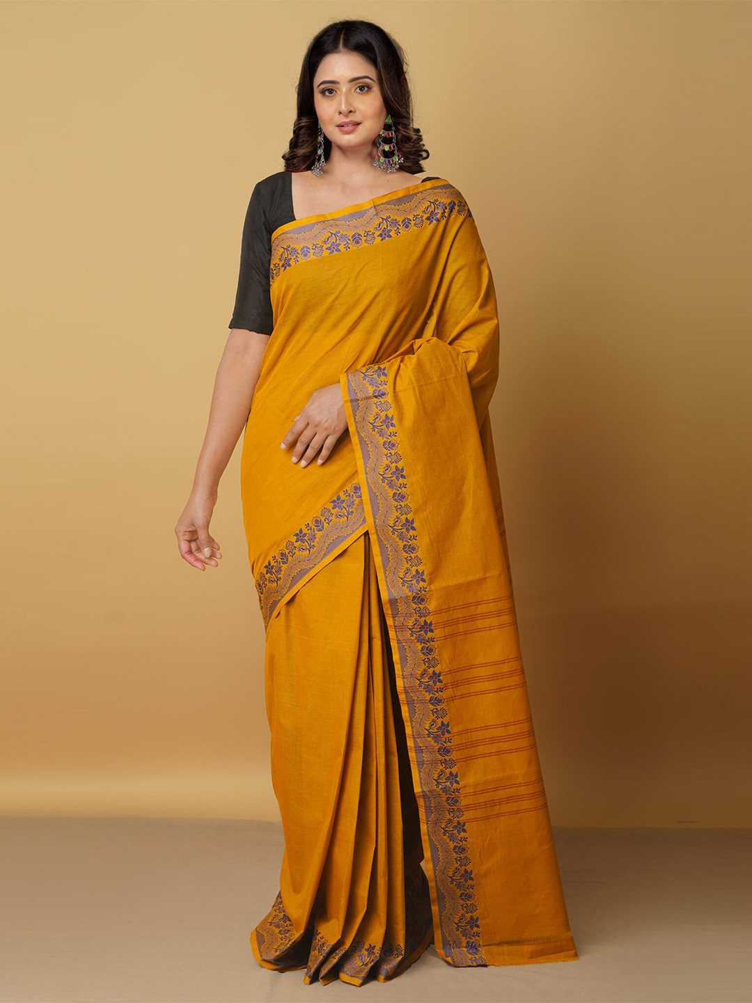 

Unnati Silks Yellow & Blue Floral Zari Pure Cotton Venkatgiri Saree