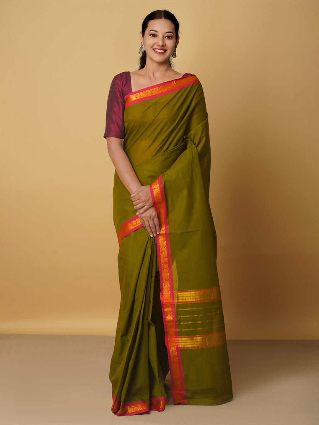 

Unnati Silks Green & Red Woven Design Pure Cotton Venkatgiri Saree
