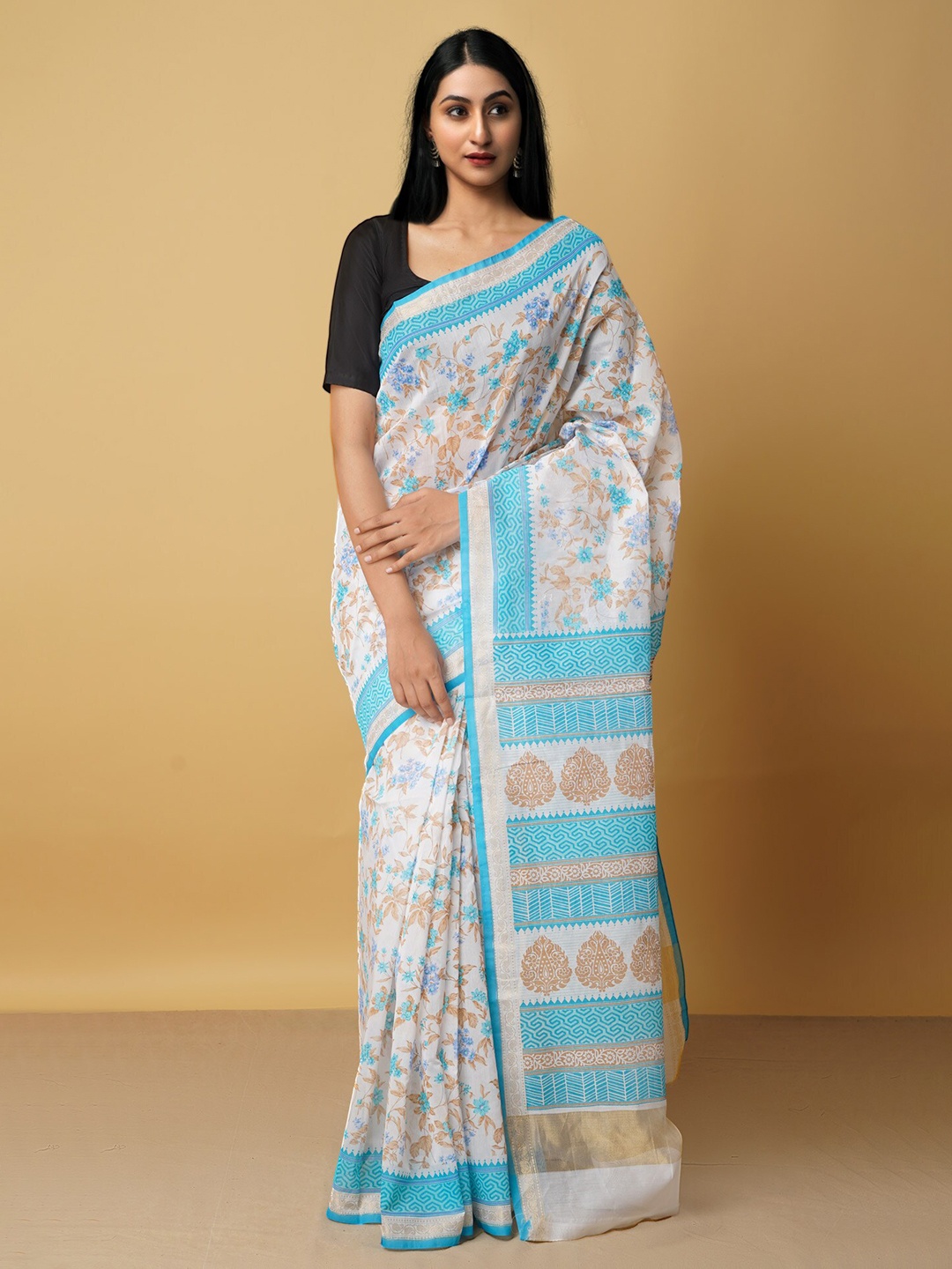 

Unnati Silks Cream-Coloured & Blue Ethnic Motifs Silk Cotton Baluchari Saree