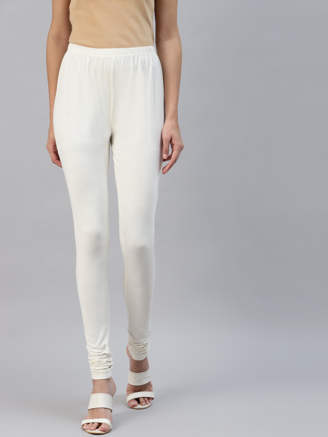 

Laabha Women Off White Solid Churidar Length Leggings