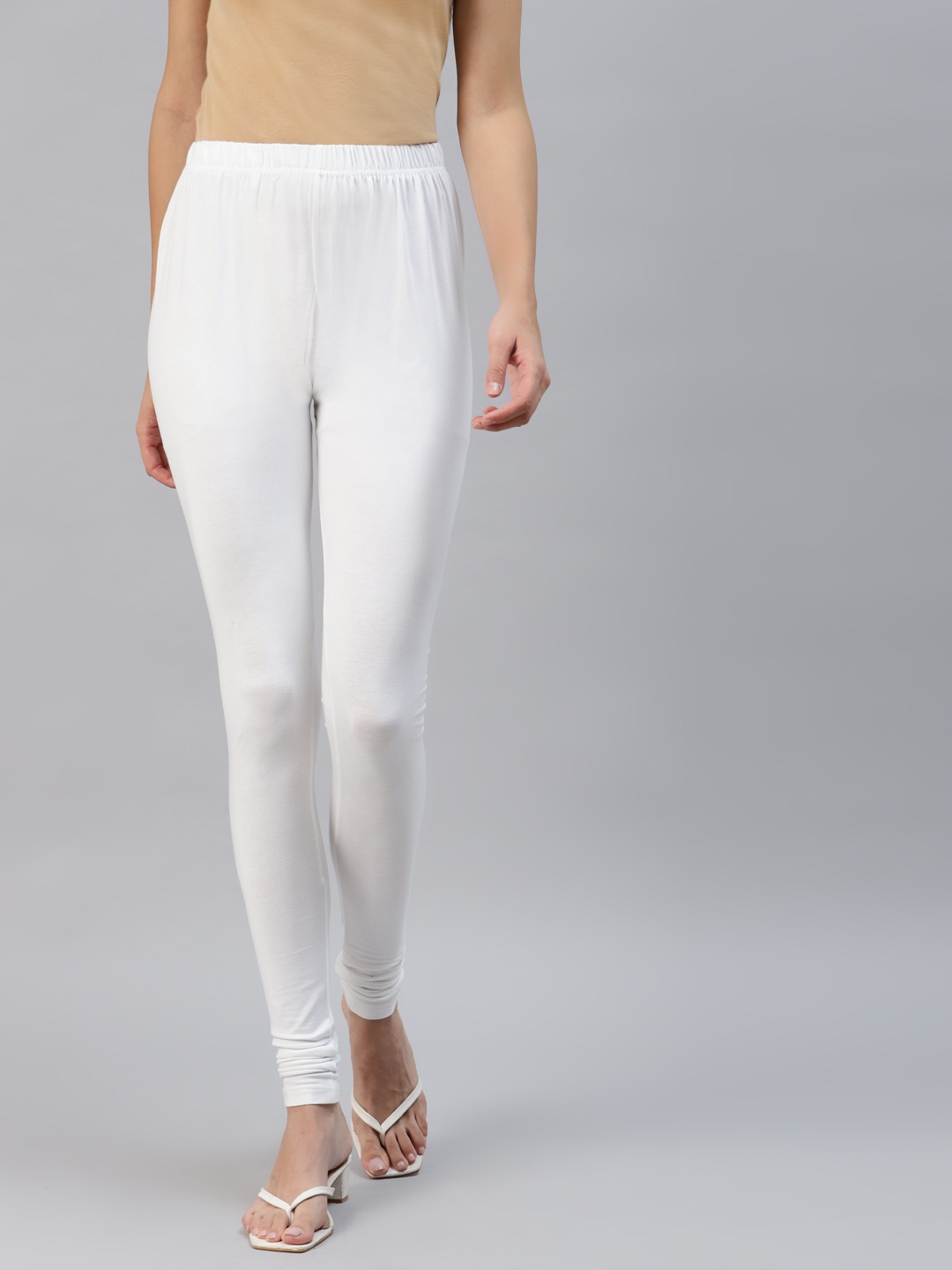 

Laabha Women White Solid Churidar Length Leggings