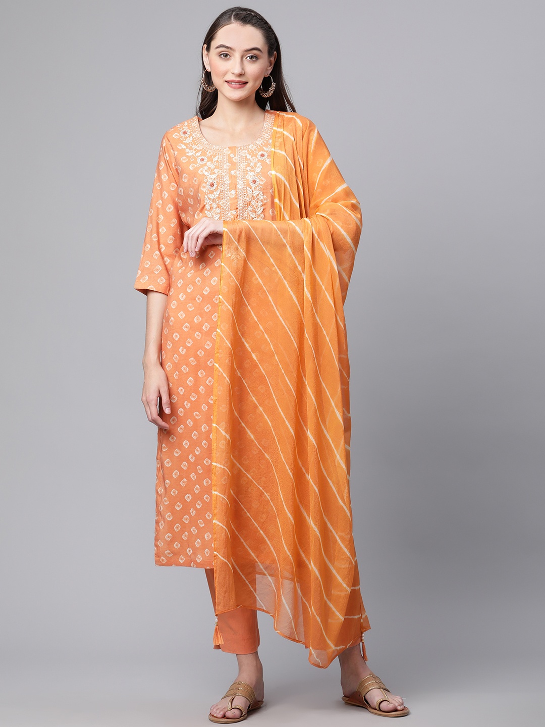 

Divena Women Orange Bandhani Printed Thread Work Chanderi Silk Kurta with Trousers & With Dupatta