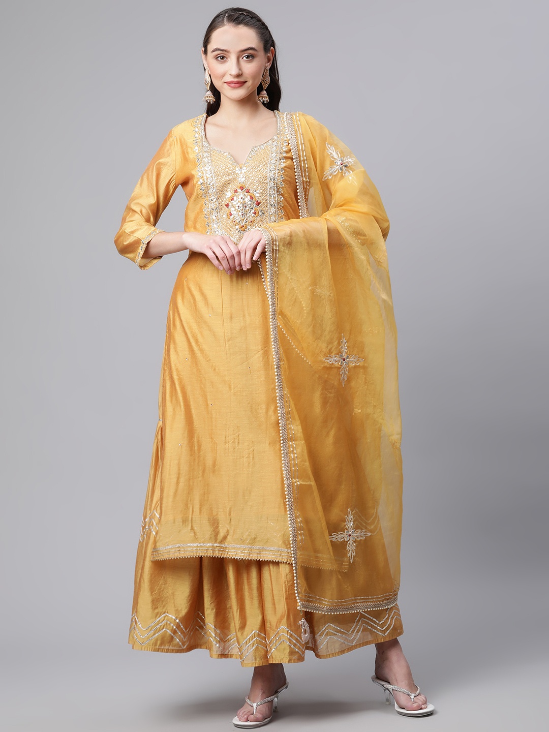 

Divena Women Yellow Ethnic Motifs Yoke Design Chanderi Silk Kurta with Sharara & With Dupatta