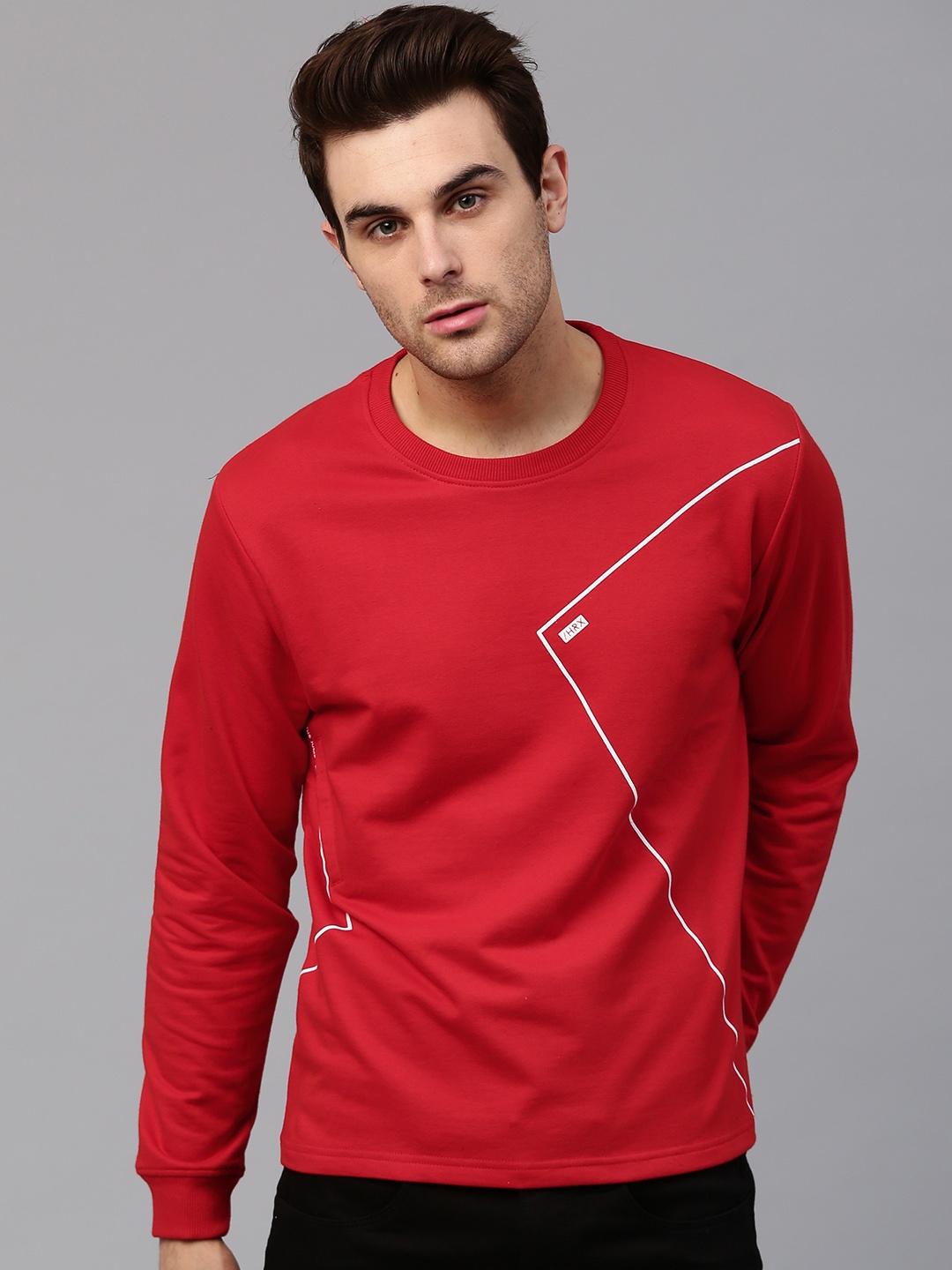 

HRX by Hrithik Roshan Men Red Solid Sweatshirt
