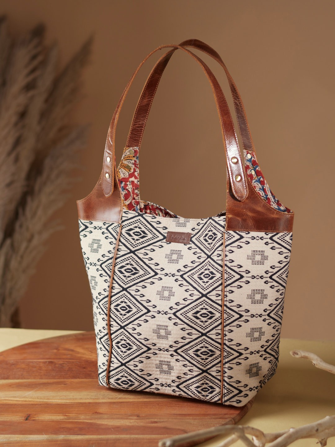 

Fabindia Beige Ethnic Motifs Structured Handheld Bag