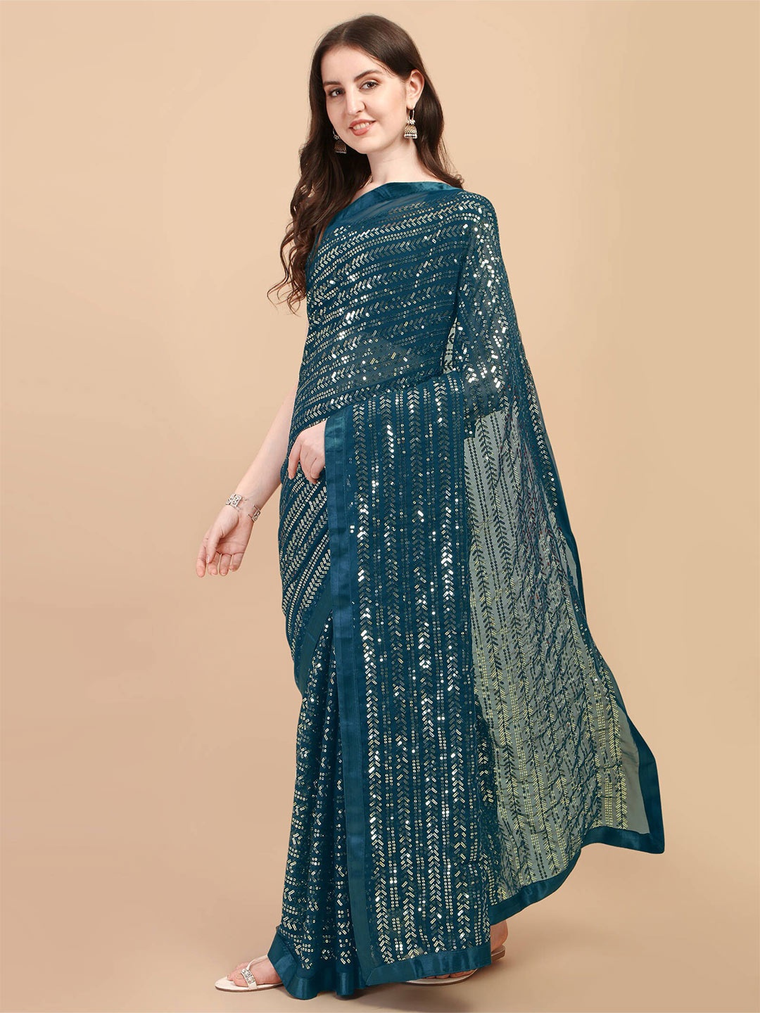 

nirja Fab Teal Embellished Sequinned Saree