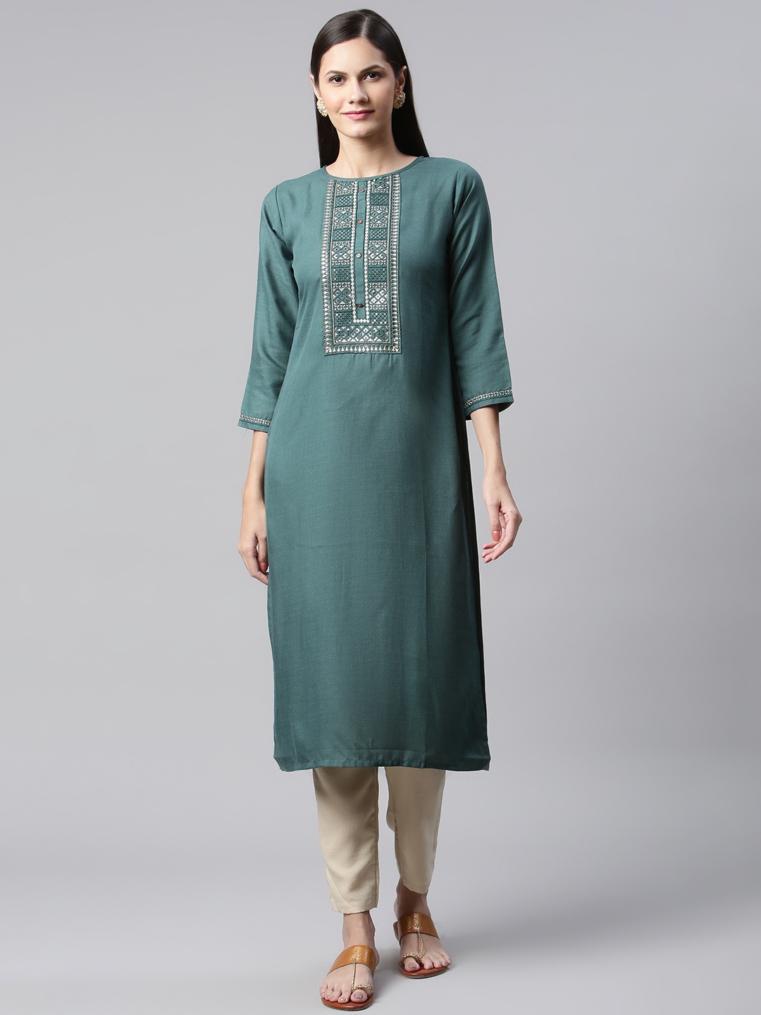 

SheWill Women Teal Ethnic Motifs Embroidered Sequinned Kurta with Trousers