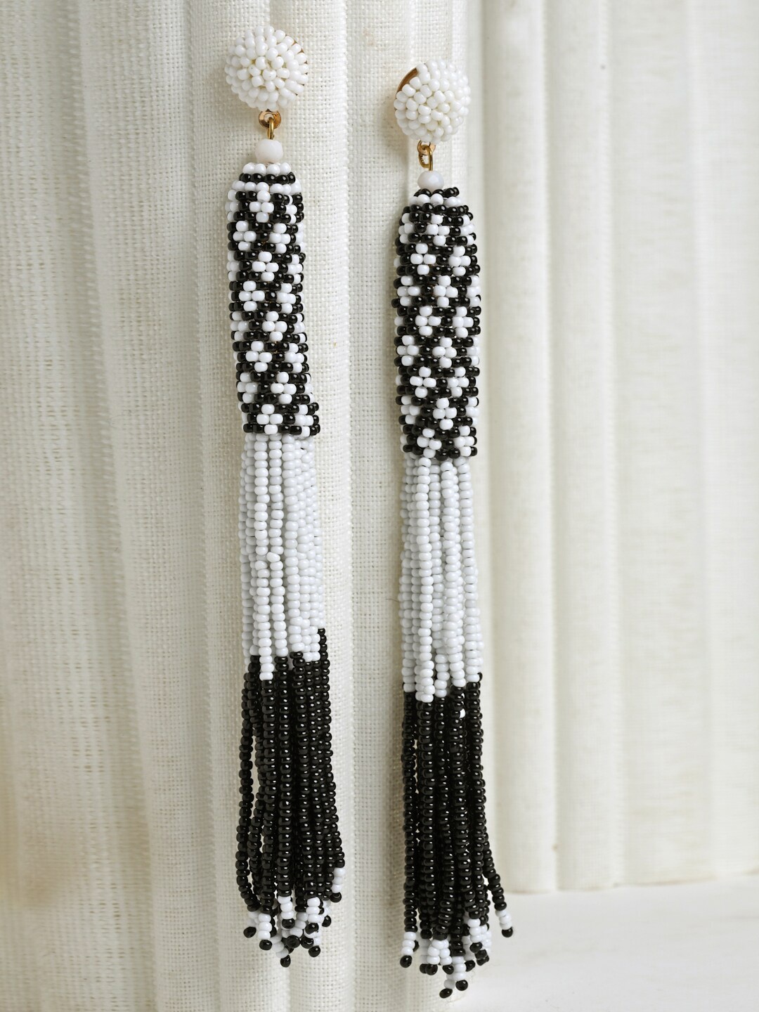 

Moedbuille Gold Plated Black & Off White Beads Contemporary Tassell Handcrafted Earrings