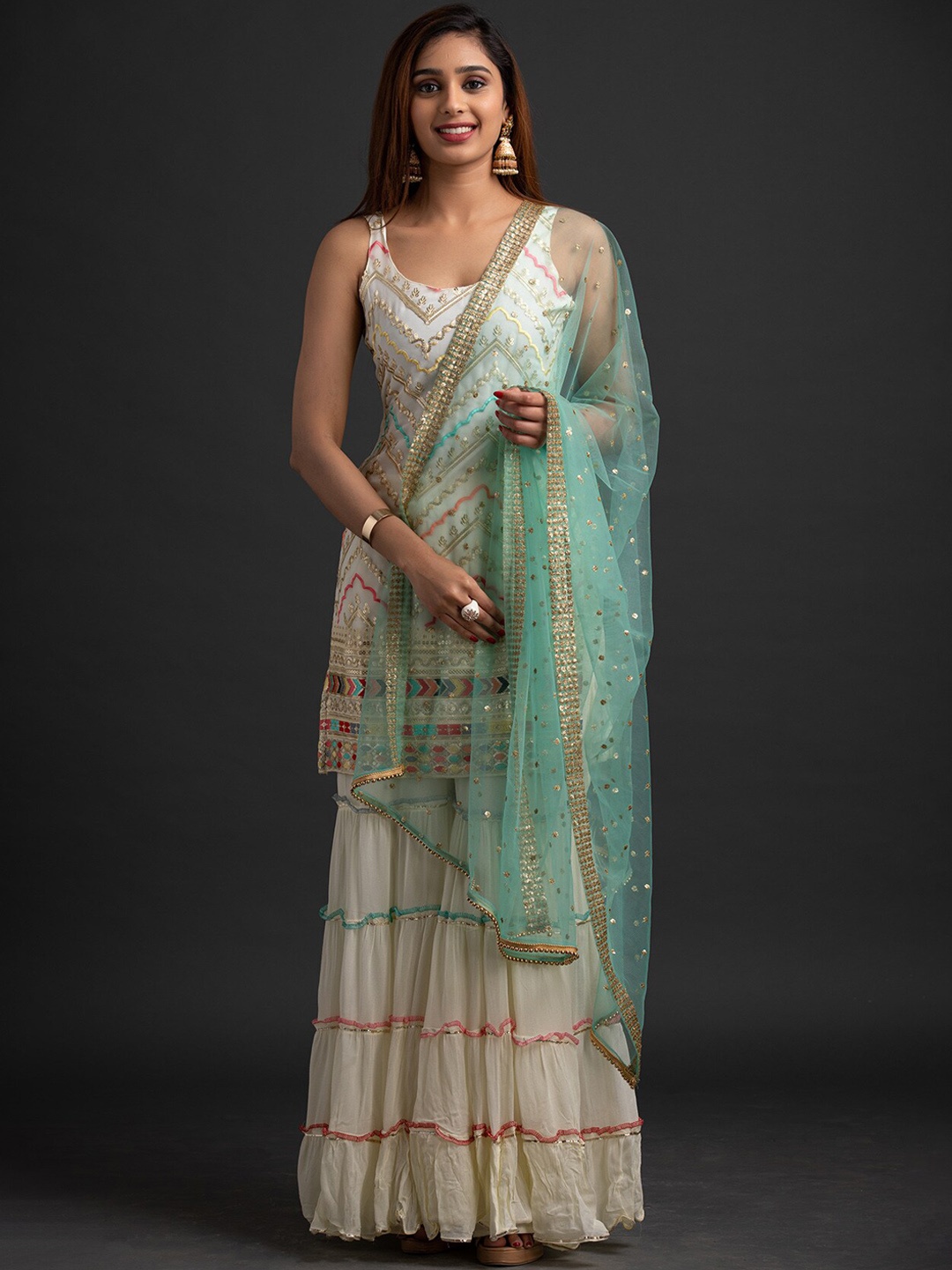 

Koskii Women Cream-Coloured Embroidered Sequined Kurti with Sharara & With Dupatta