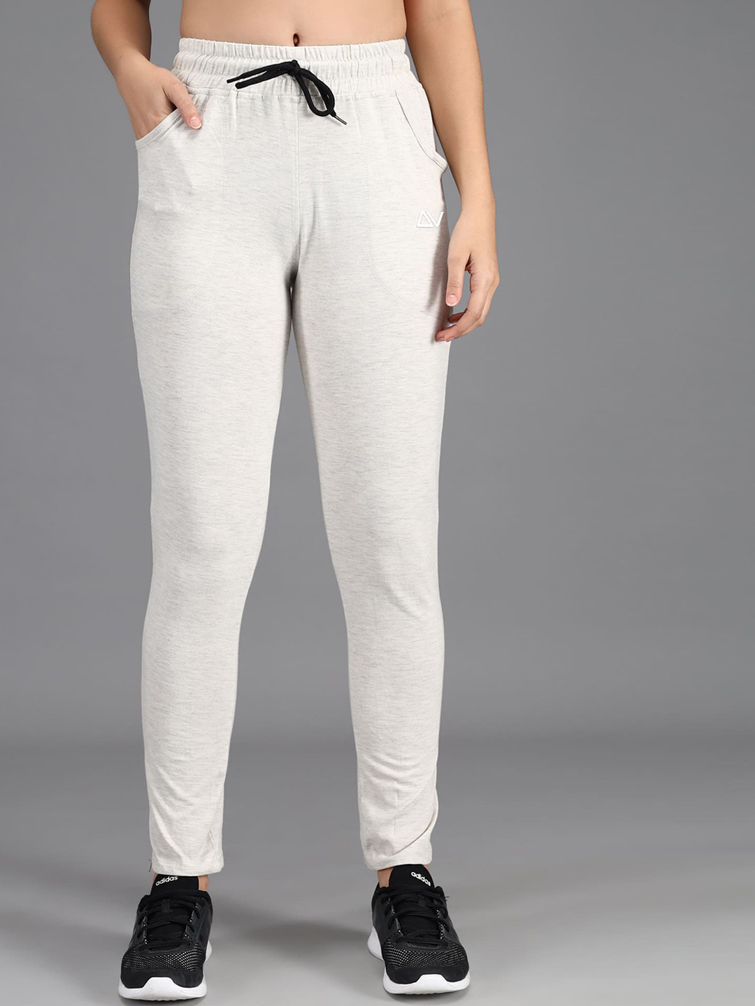 

ADDYVERO Women Off White Solid Track Pants
