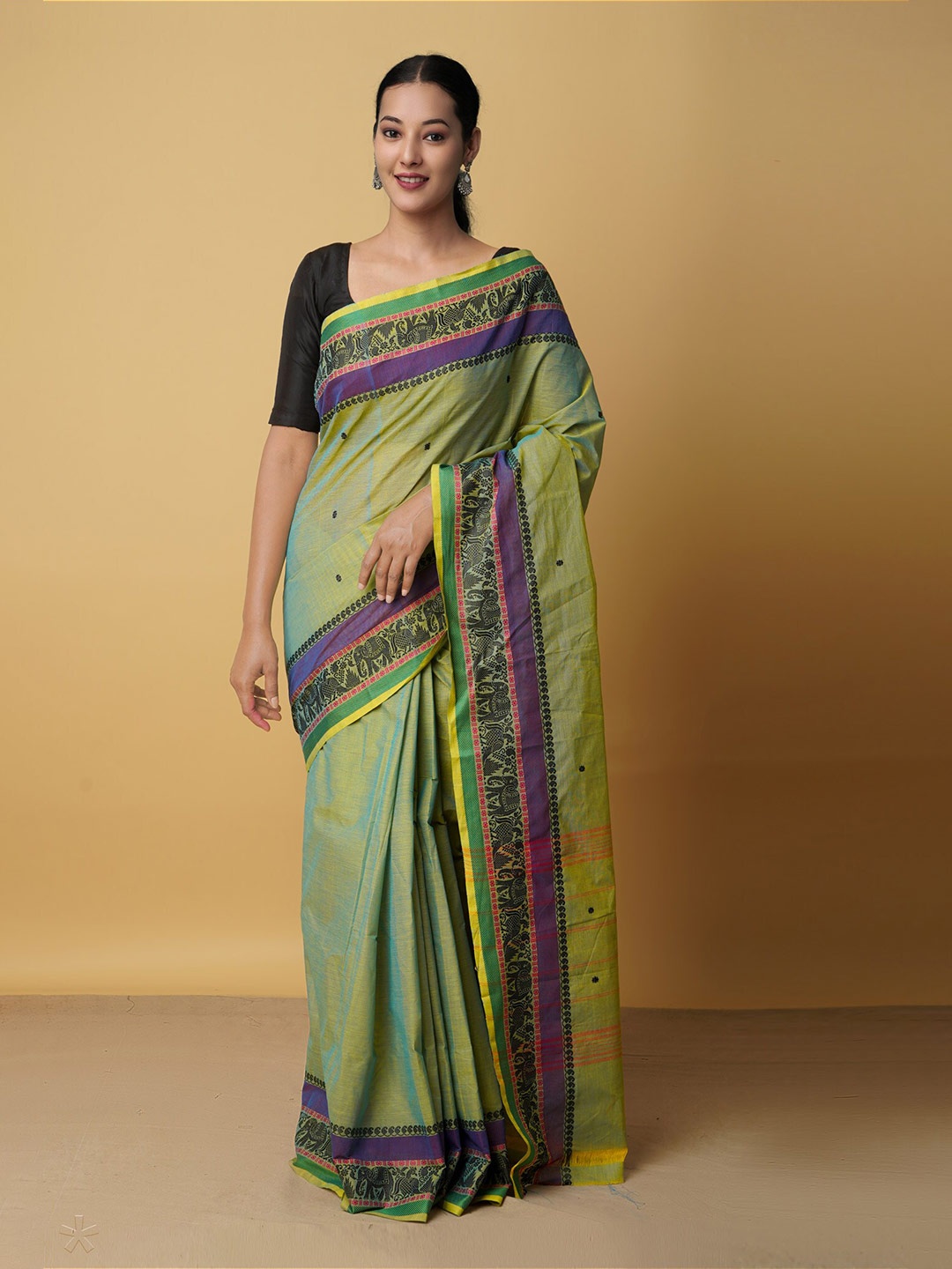 

Unnati Silks Green & Purple Woven Design Zari Pure Cotton Chettinad Saree