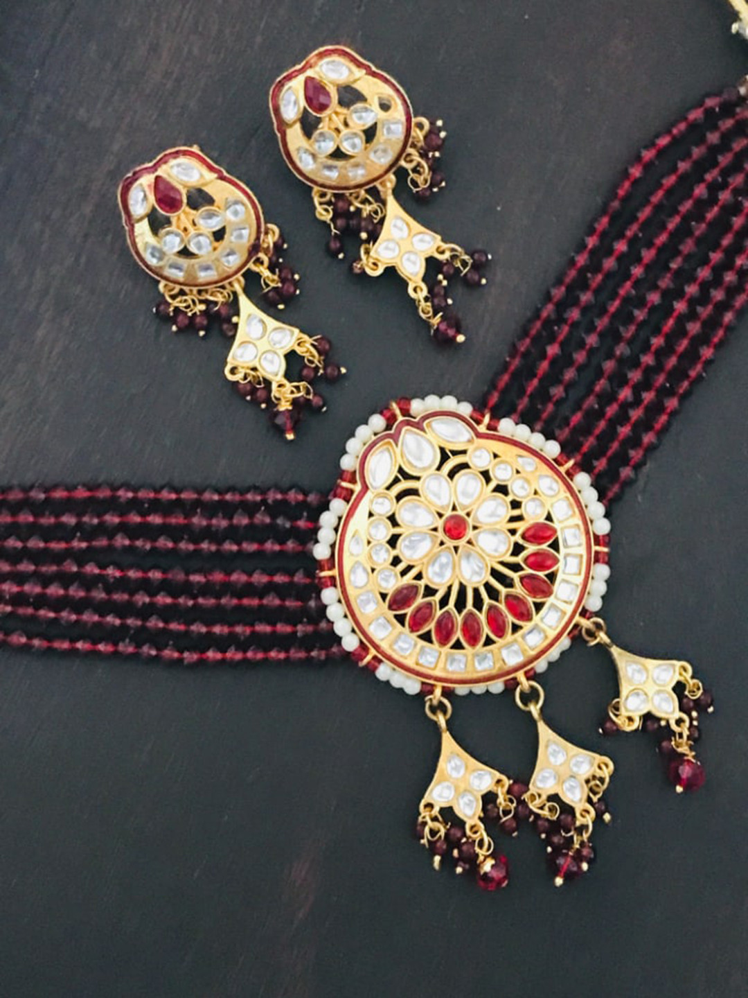 

The Opal Factory Maroon Kundan-Studded Jewellery Set
