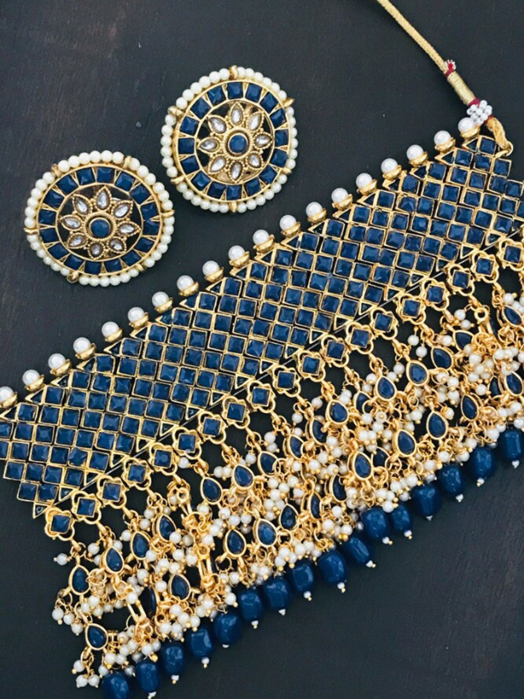 

The Opal Factory Gold-Plated Blue & White Stone Studded & Beaded Jadau Jewellery Set