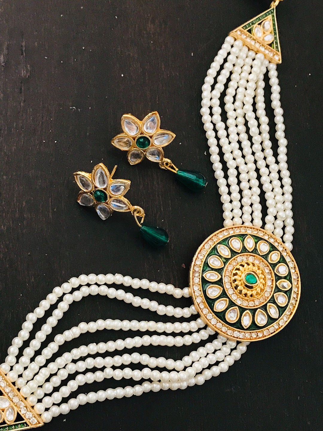 

The Opal Factory Gold-Plated Green & White Kundan Studded & Beaded Jewellery Set