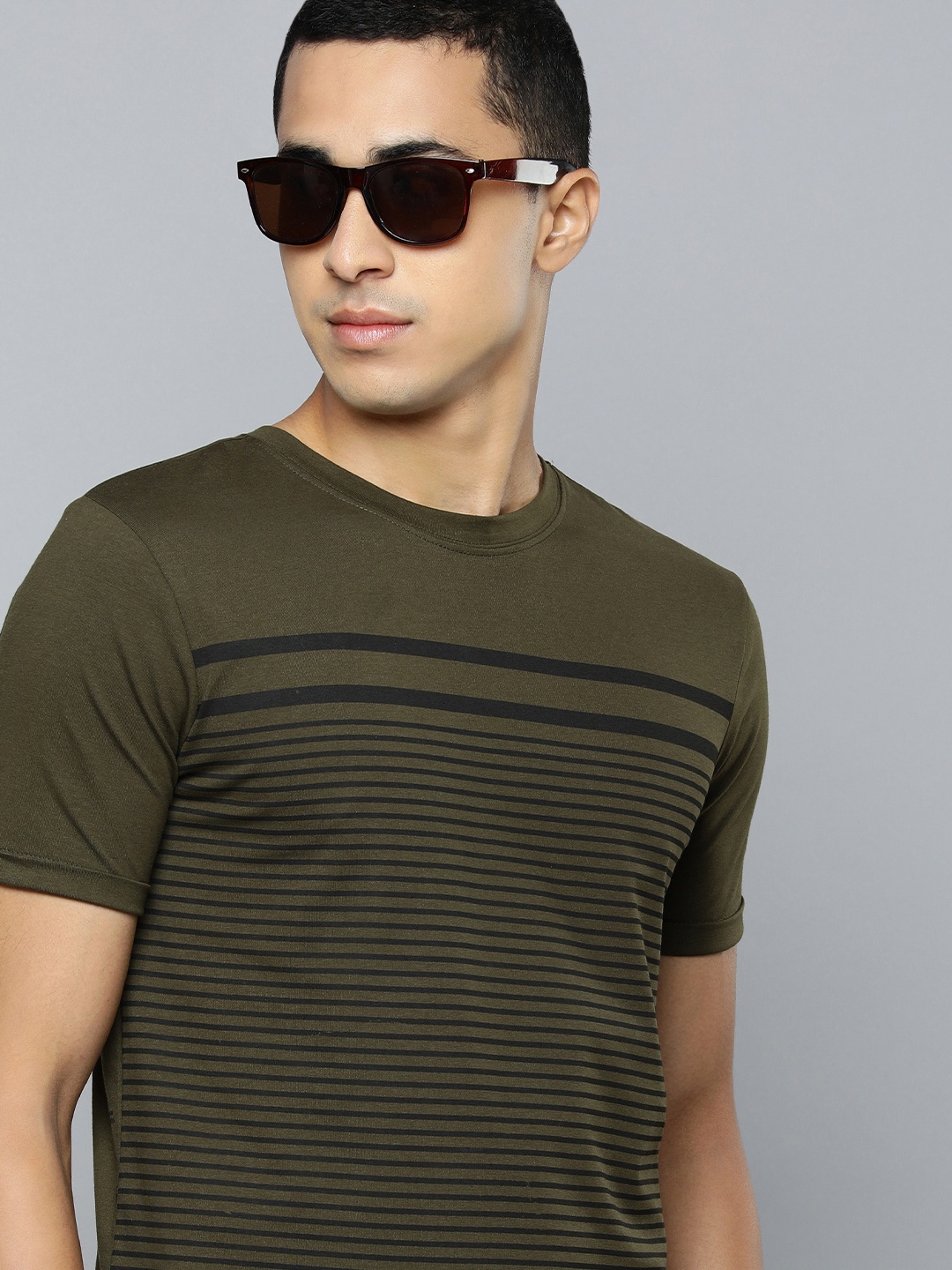 

Lawman pg3 Men Olive Green & Black Striped And Printed Slim Fit T-shirt