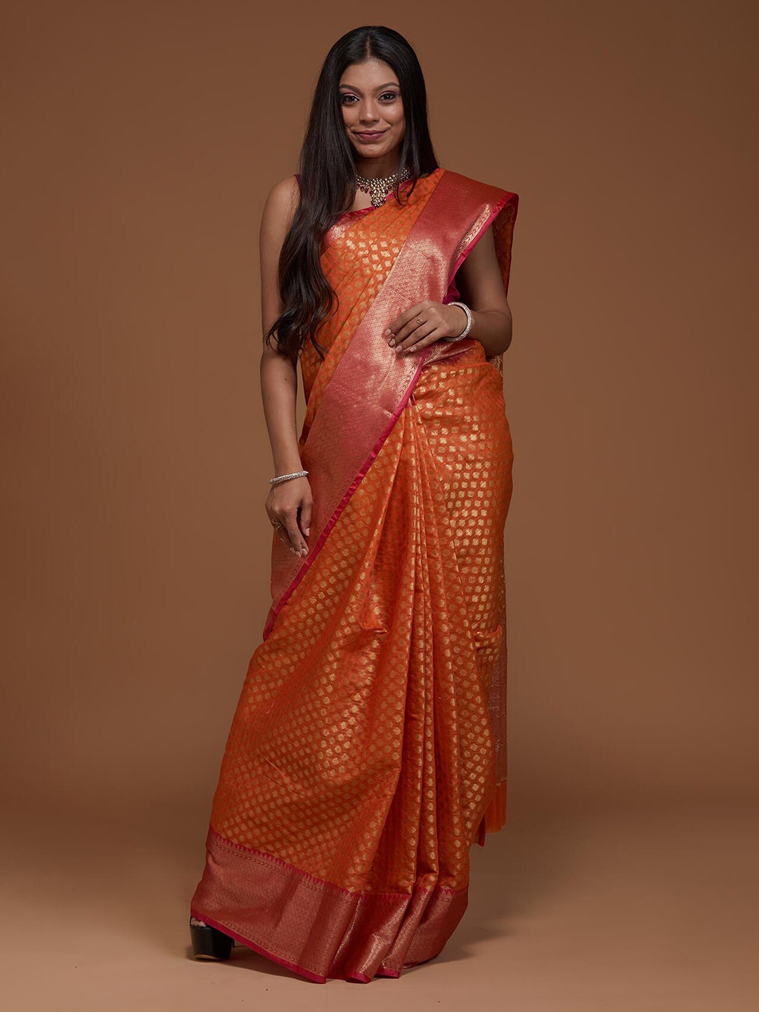 

Koskii Orange Woven Design Zari Art Silk Banarasi Saree