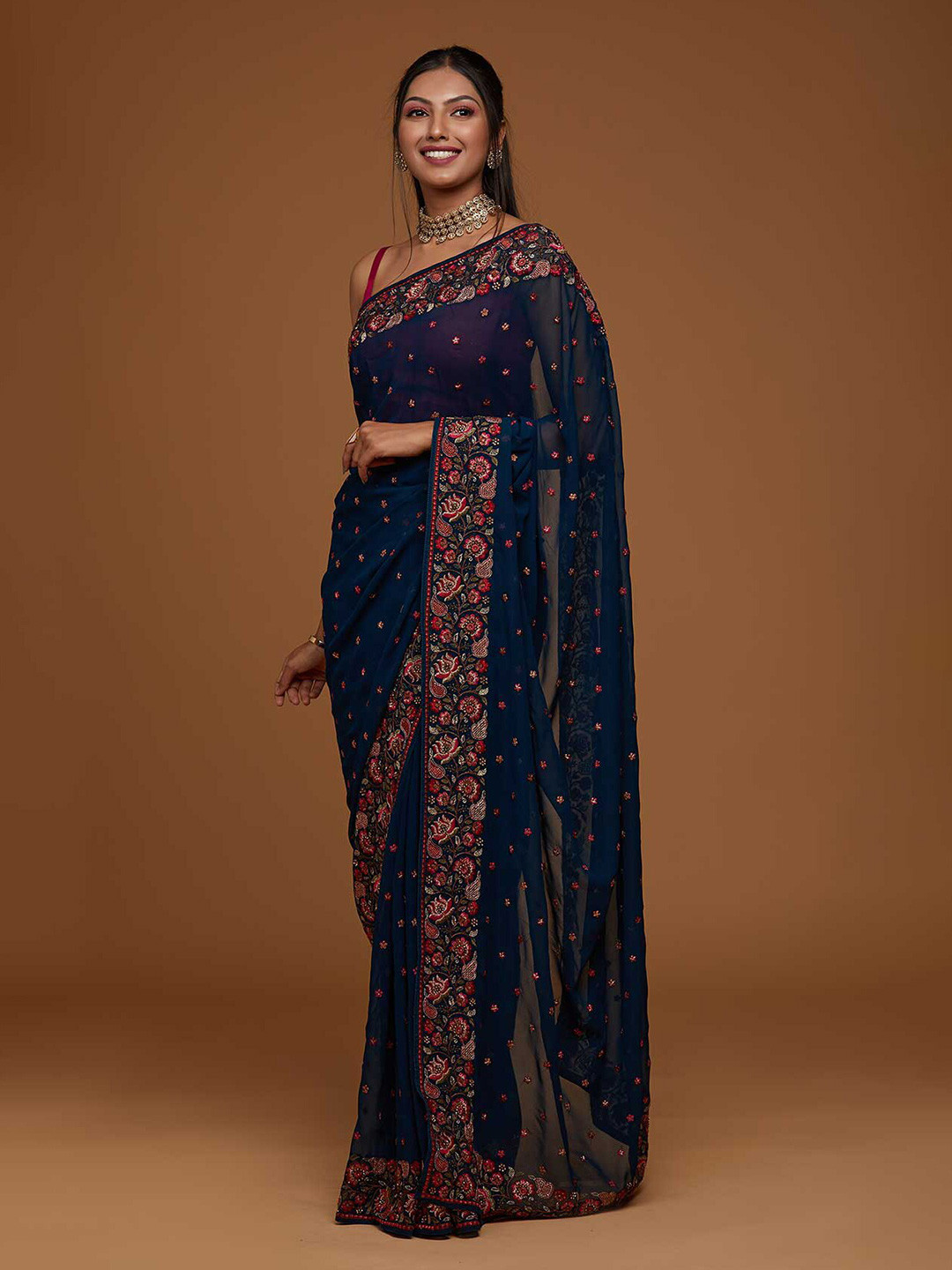 

Koskii Women Blue Floral Embroidered Saree