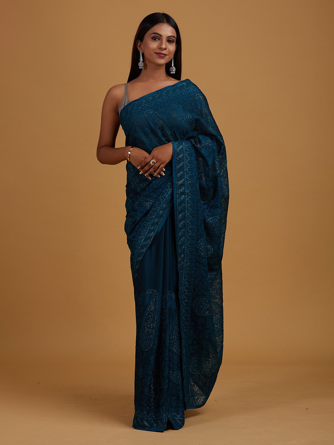 

Koskii Blue & Silver-Toned Paisley Embroidered Supernet Saree