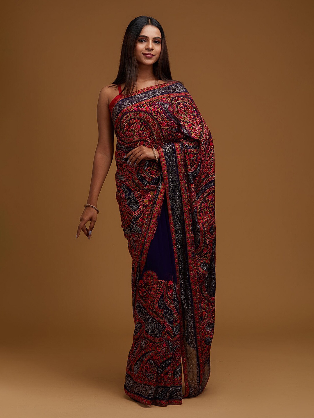 

Koskii Women Navy Blue & Red Embellished Embroidered Saree