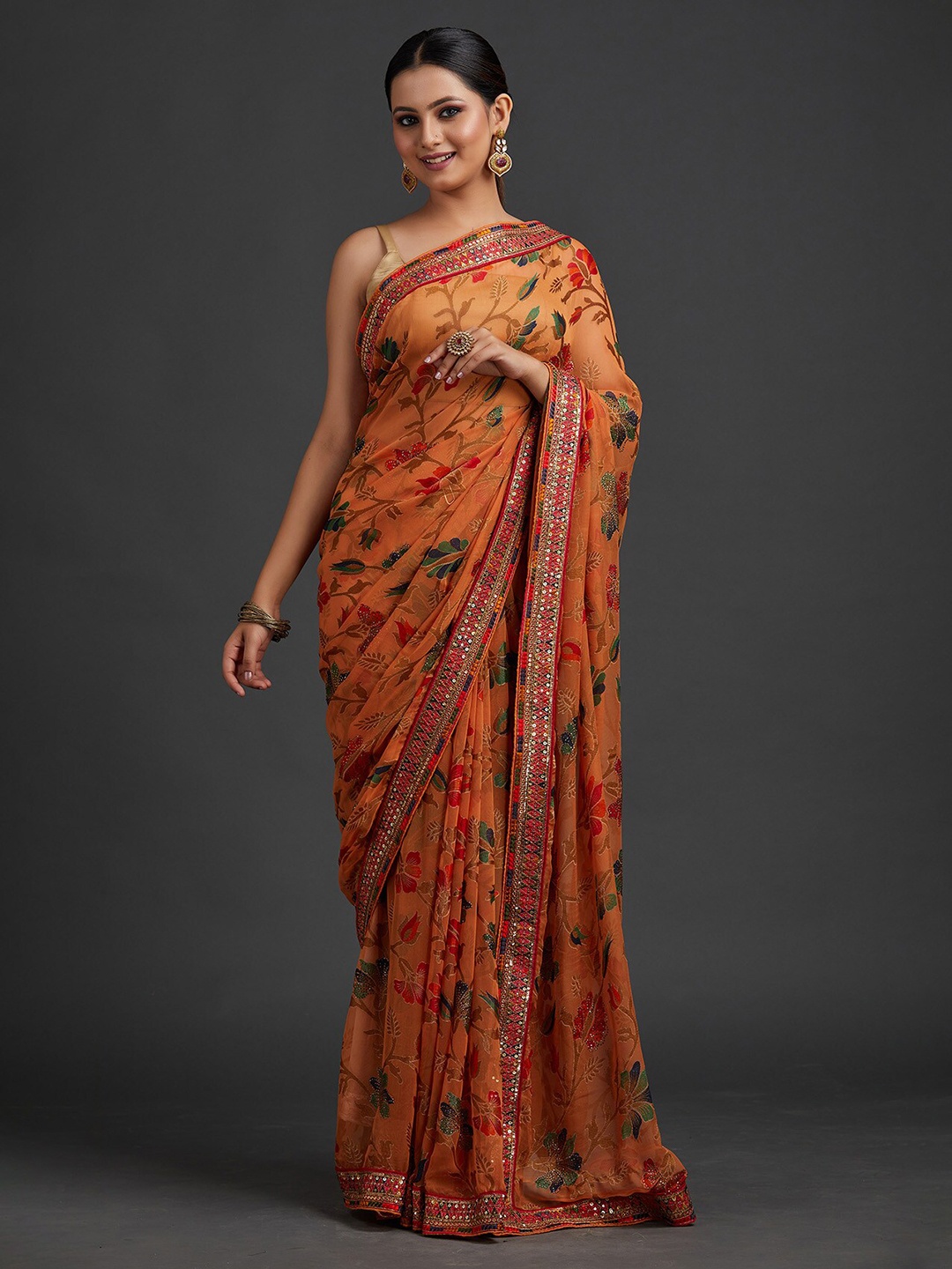 

Koskii Women Orange & Green Floral Sequinned Saree