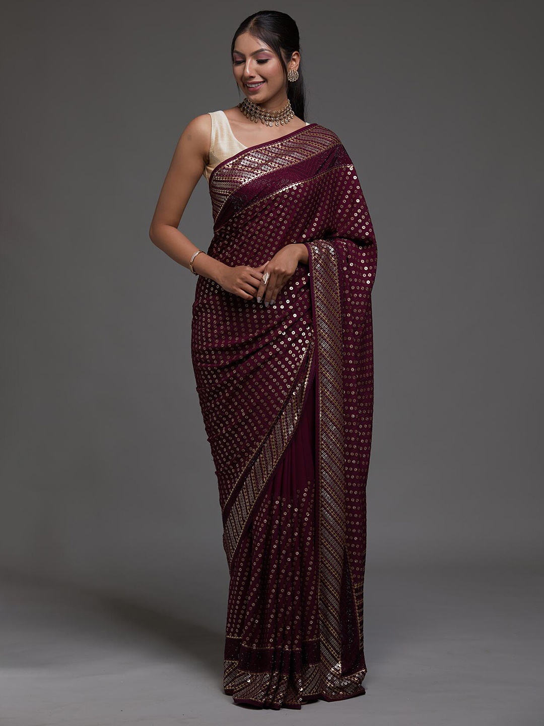 

Koskii Maroon Embellished Sequinned Saree