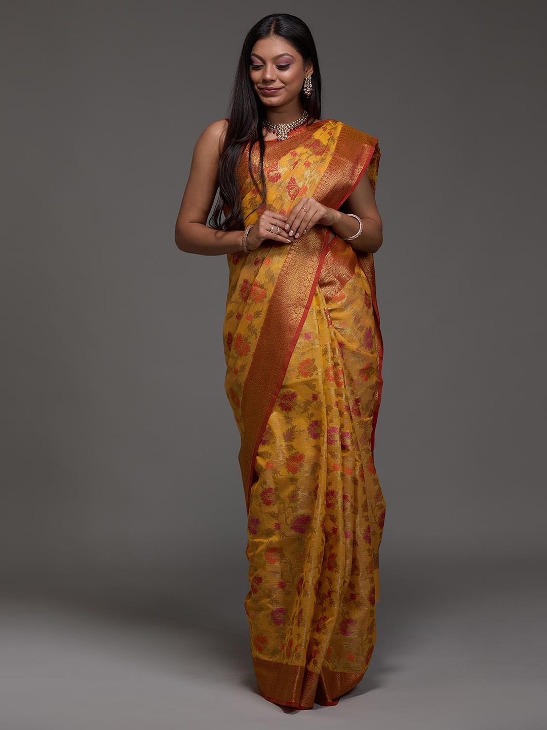 

Koskii Cream-Coloured & Red Floral Zari Art Silk Saree