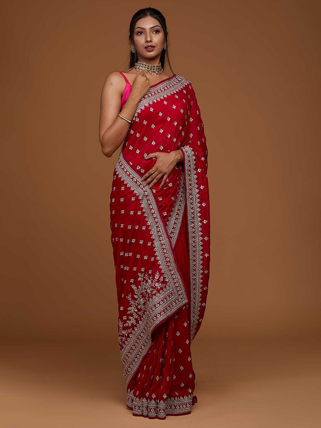 

Koskii Red & Silver-Toned Ethnic Motifs Beads and Stones Art Silk Saree