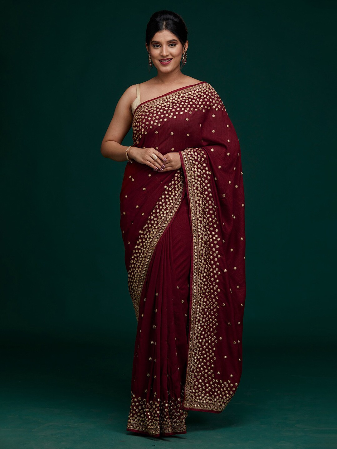 

Koskii Maroon & Gold-Toned Embroidered Art Silk Saree