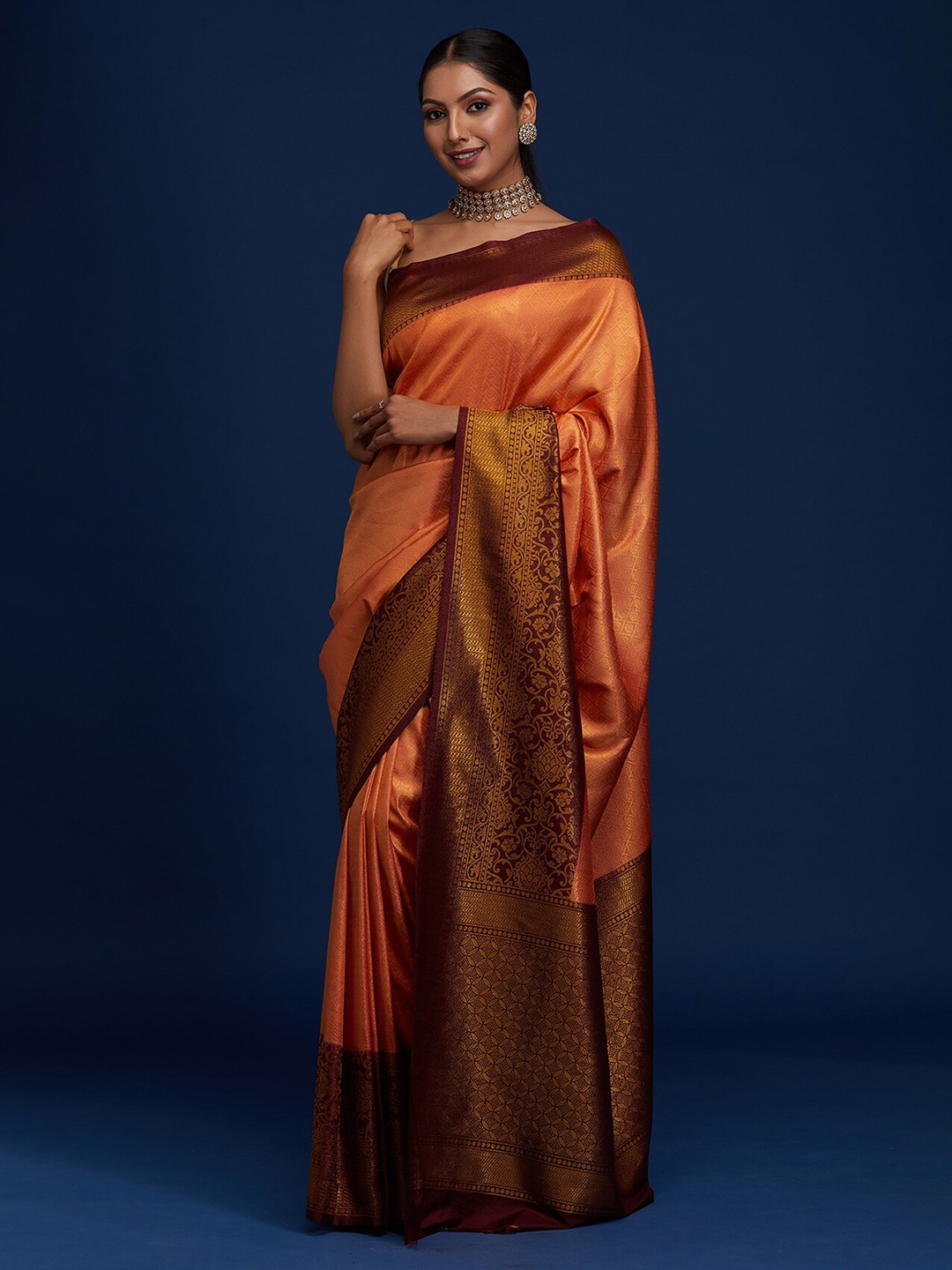 

Koskii Orange & Brown Woven Design Zari Art Silk Banarasi Saree