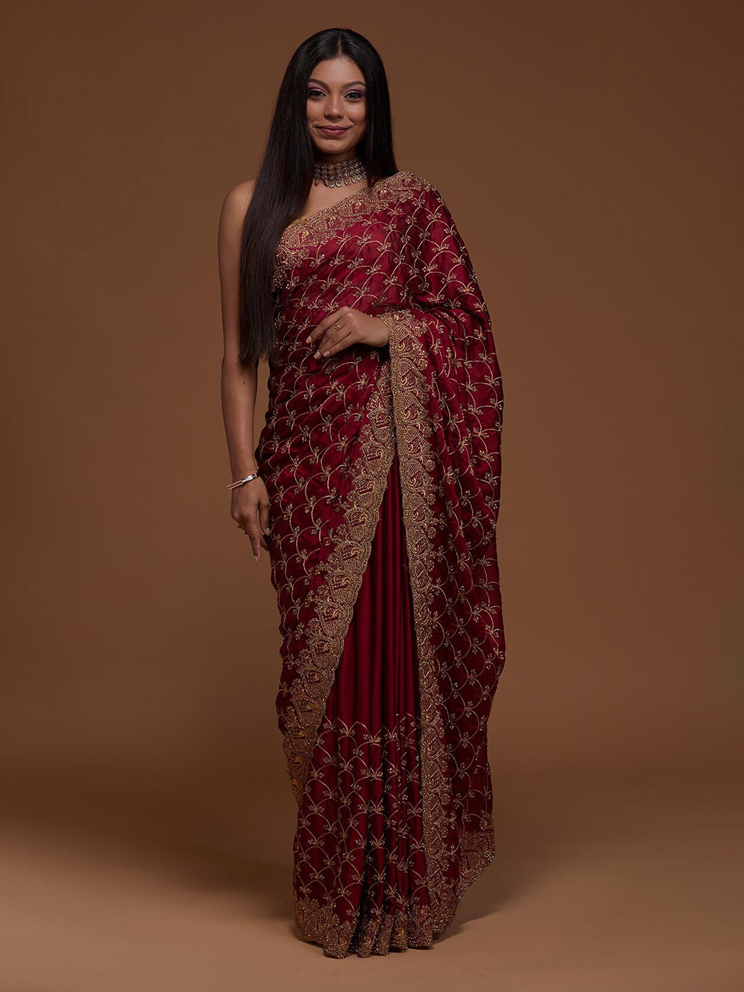 

Koskii Maroon & Gold-Toned Floral Zari Saree