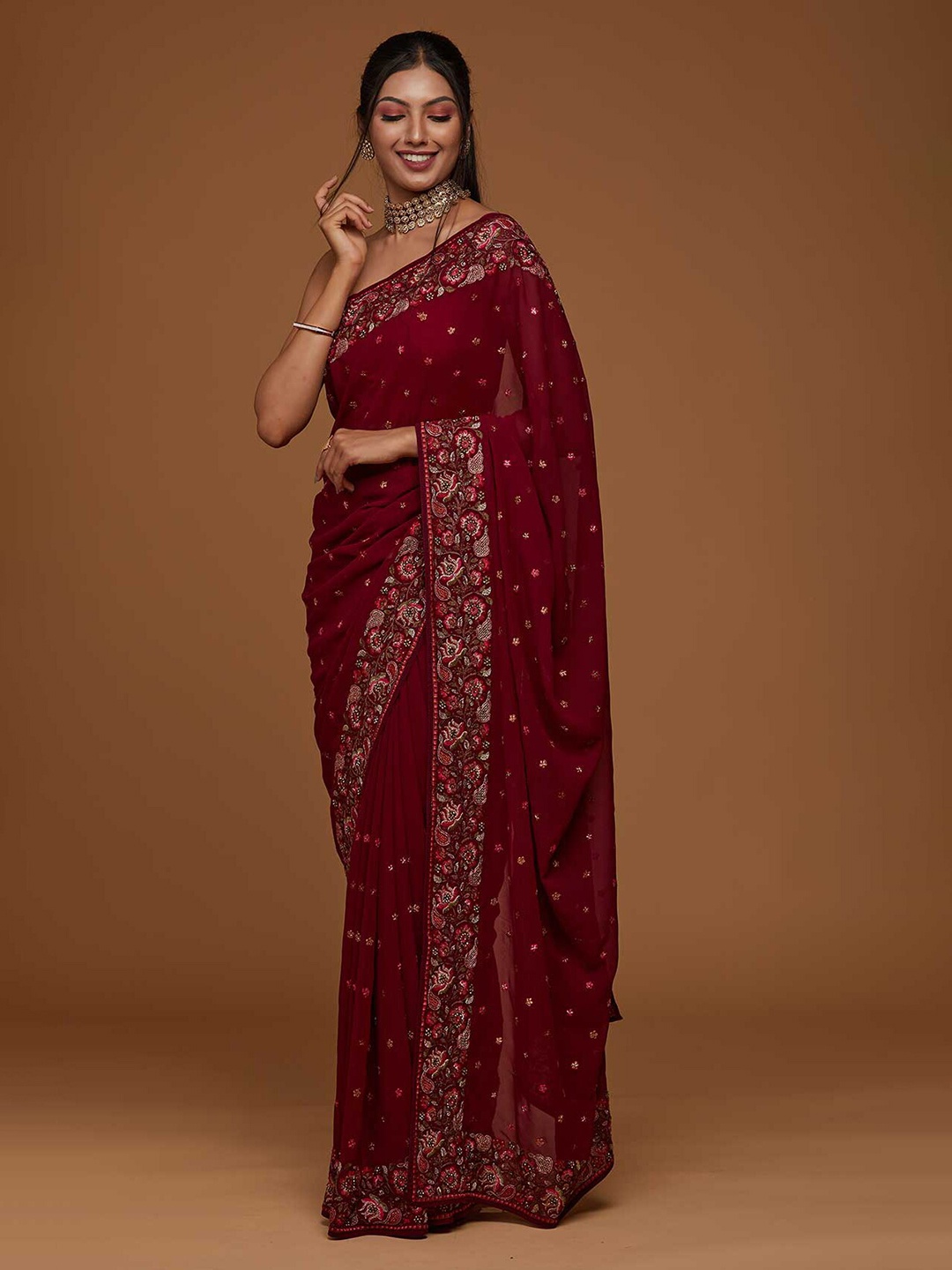 

Koskii Maroon & Green Floral Zari Saree