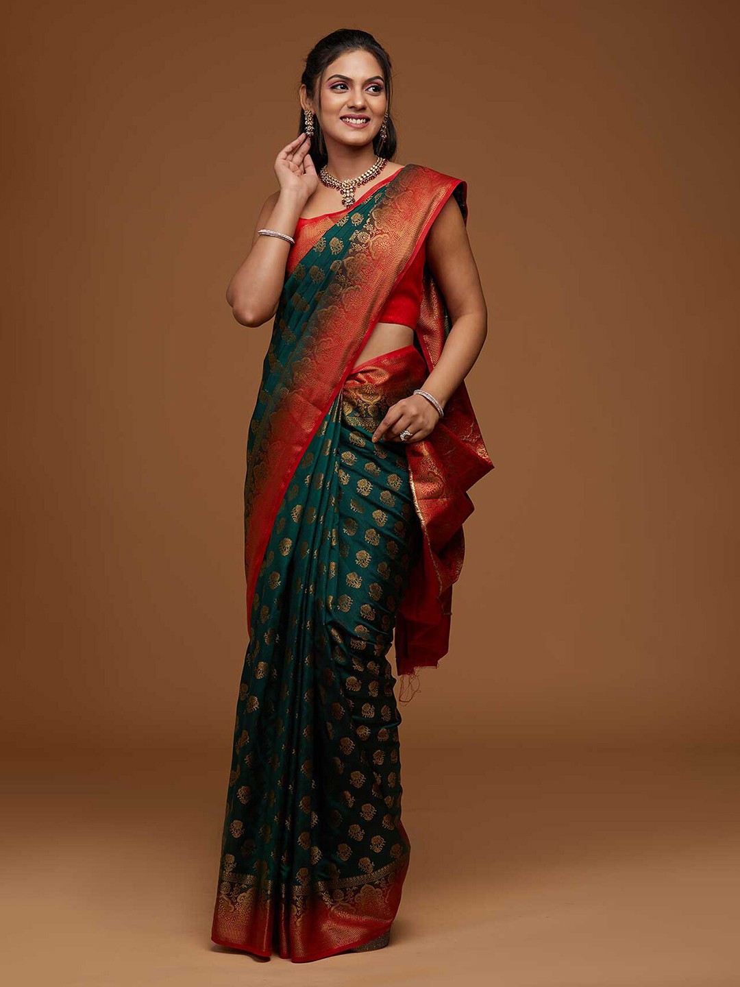 

Koskii Green & Gold-Toned Woven Design Zari Art Silk Banarasi Saree