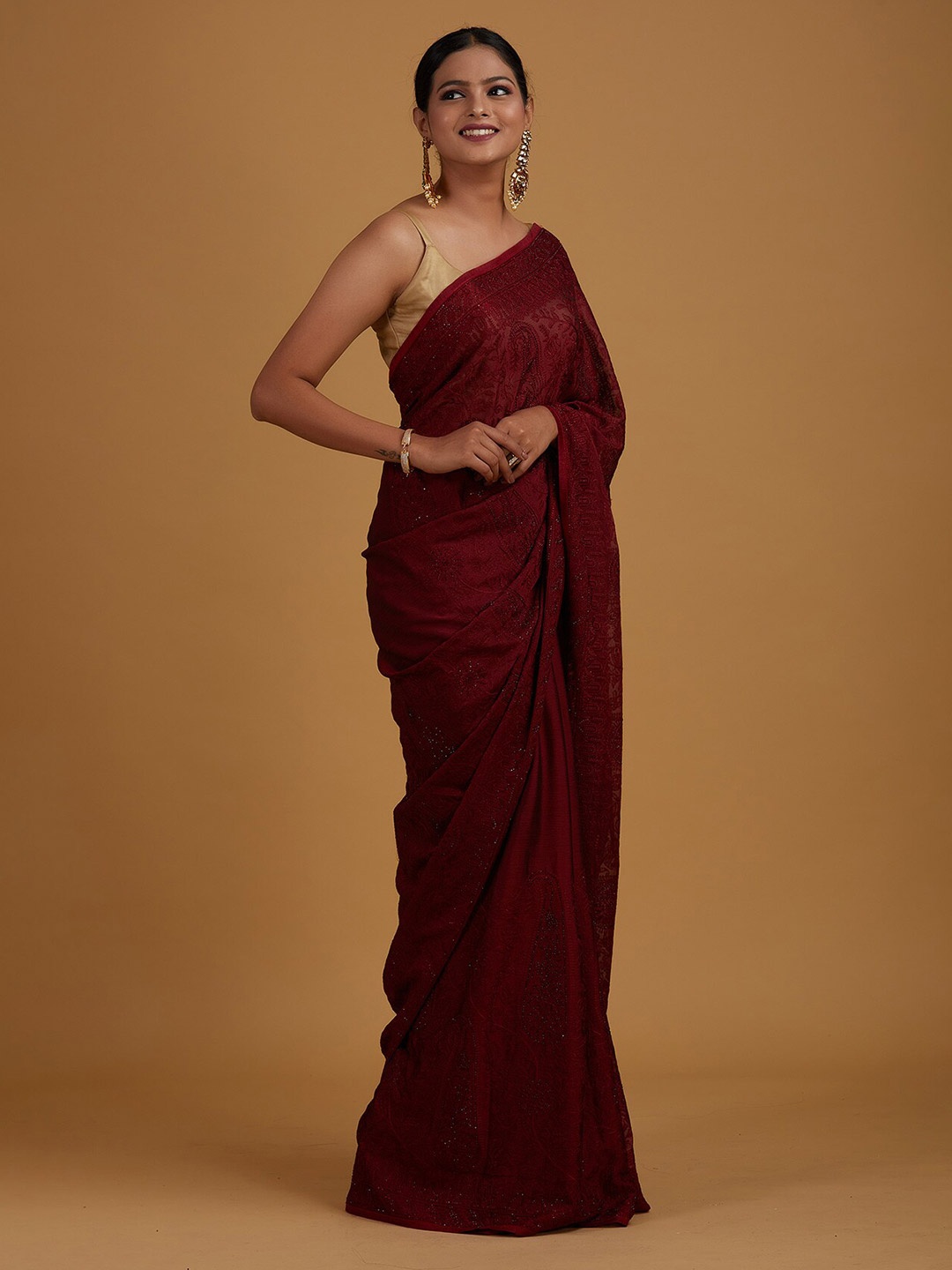 

Koskii Maroon Floral Embroidered Saree