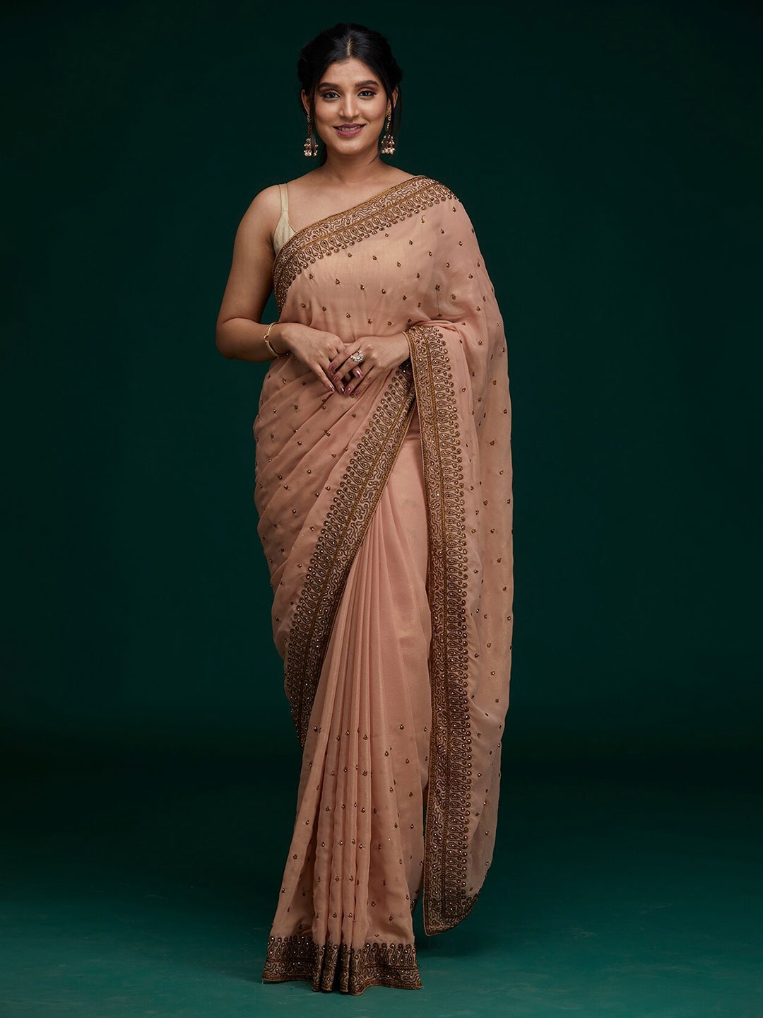 

Koskii Peach-Coloured Ethnic Motifs Embroidered Saree