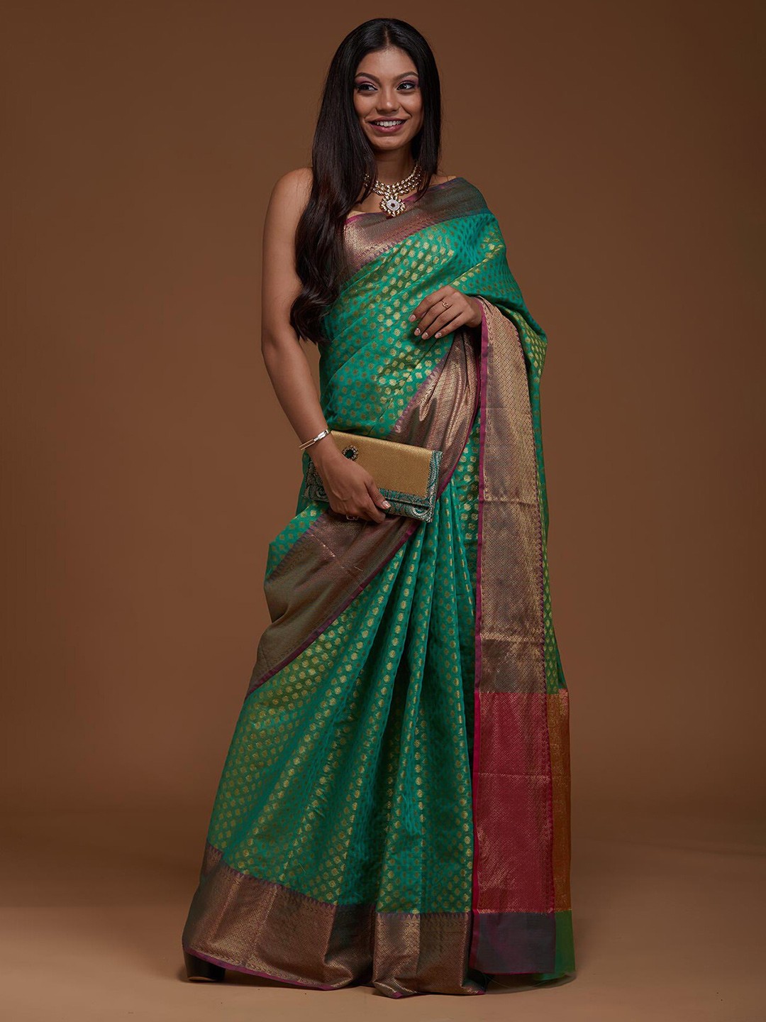 

Koskii Green & Pink Woven Design Zari Art Silk Banarasi Saree