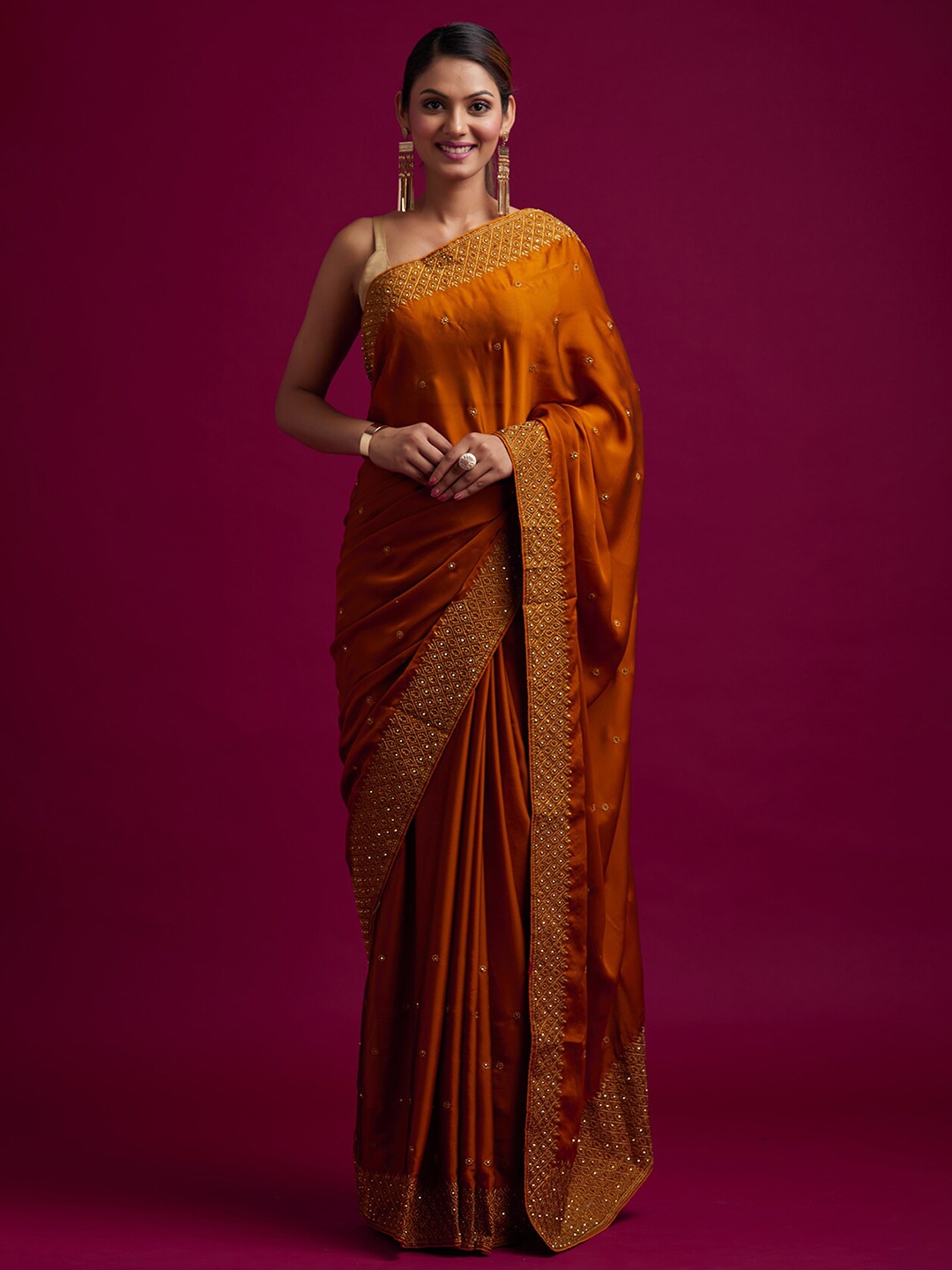

Koskii Women Mustard & Gold-Toned Floral Zari Saree
