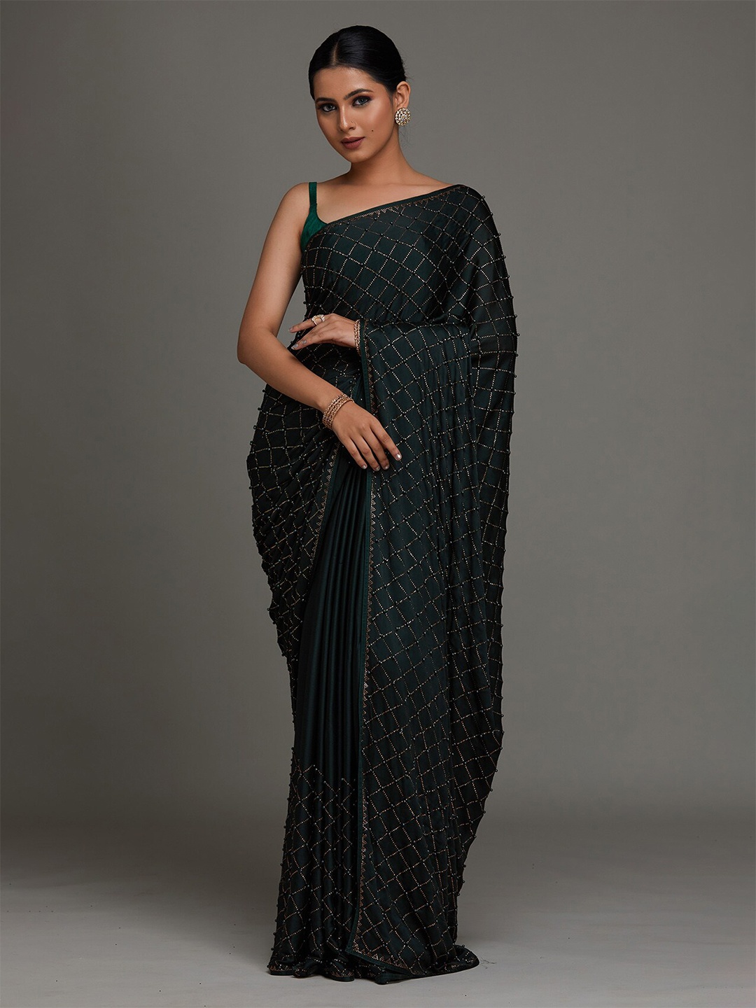 

Koskii Green Embellished Shimmer Saree