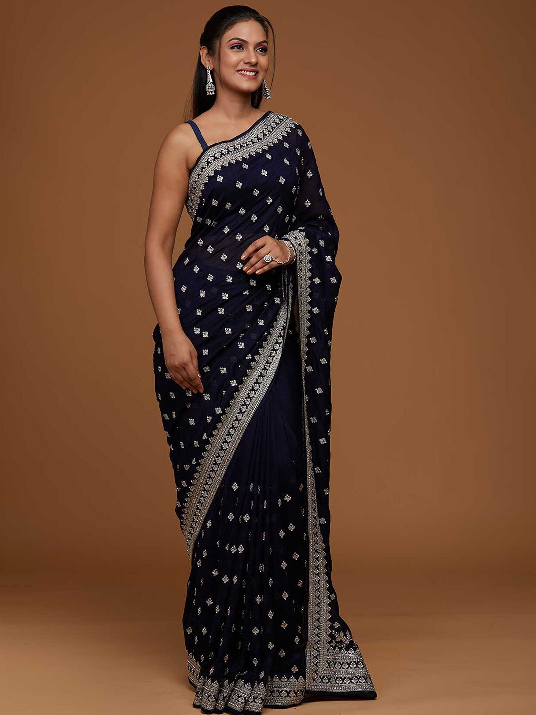 

Koskii Women Navy Blue & Silver-Toned Floral Zari Art Silk Heavy Work Saree