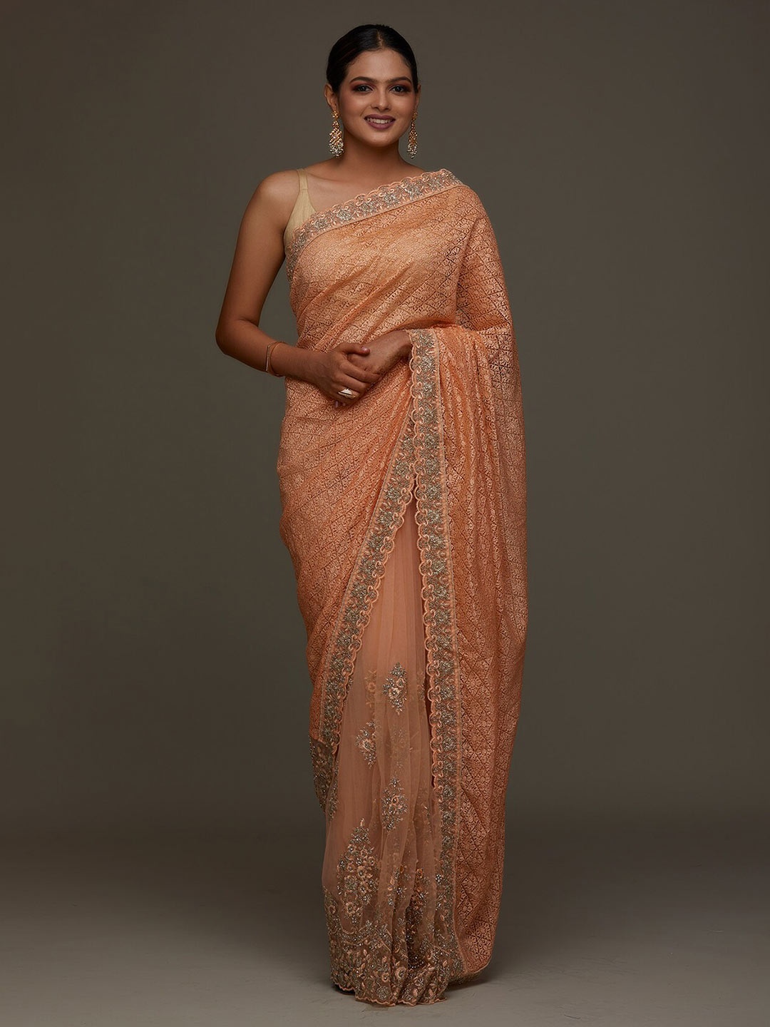 

Koskii Peach-Coloured & Silver-Toned Floral Embroidered Supernet Saree