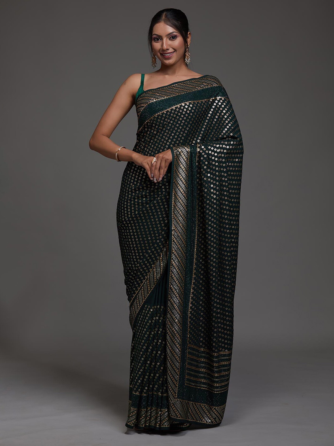 

Koskii Green & Gold-Toned Embellished Saree