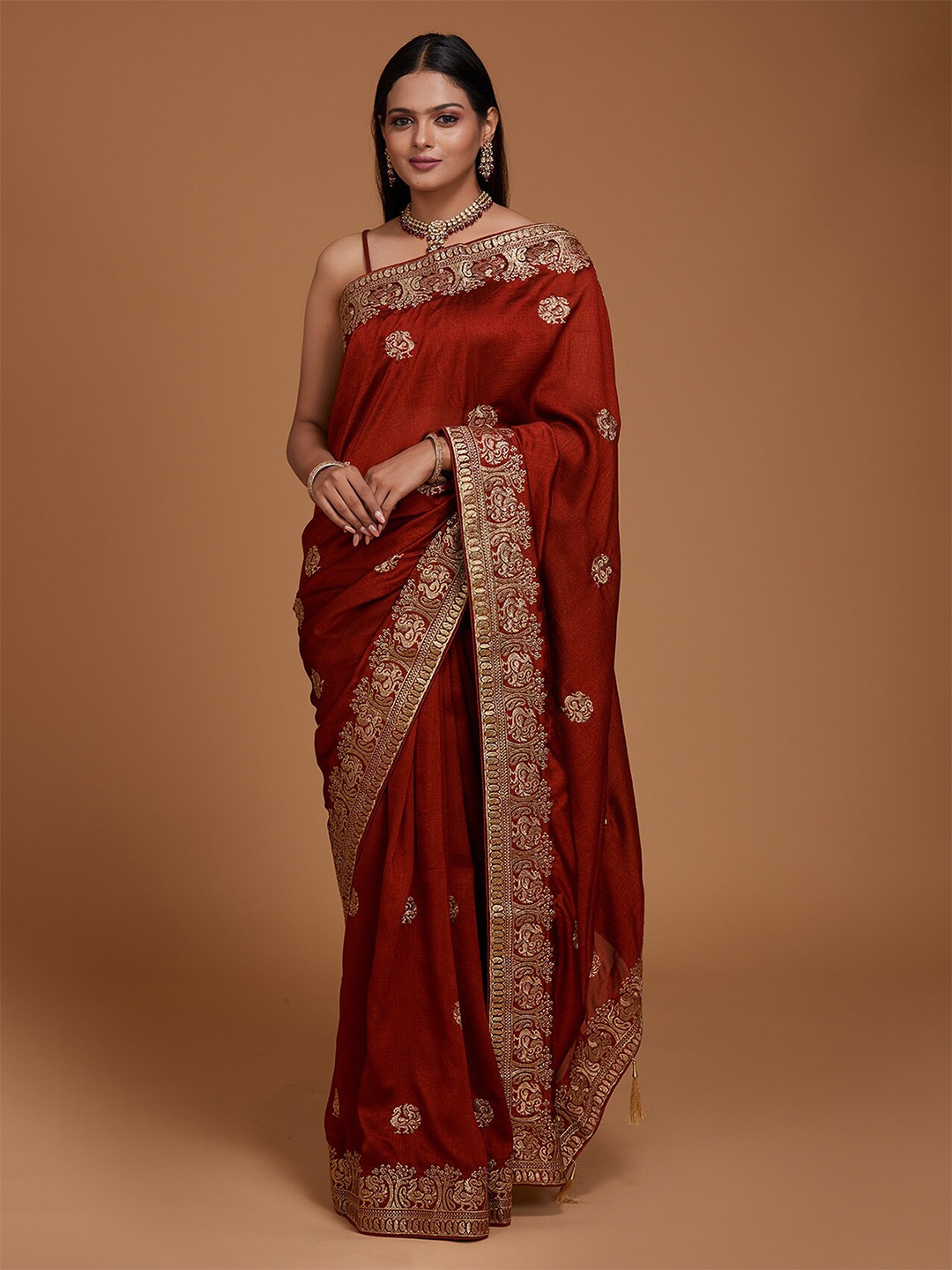 

Koskii Women Maroon & Gold-Toned Ethnic Motifs Zari Art Silk Saree