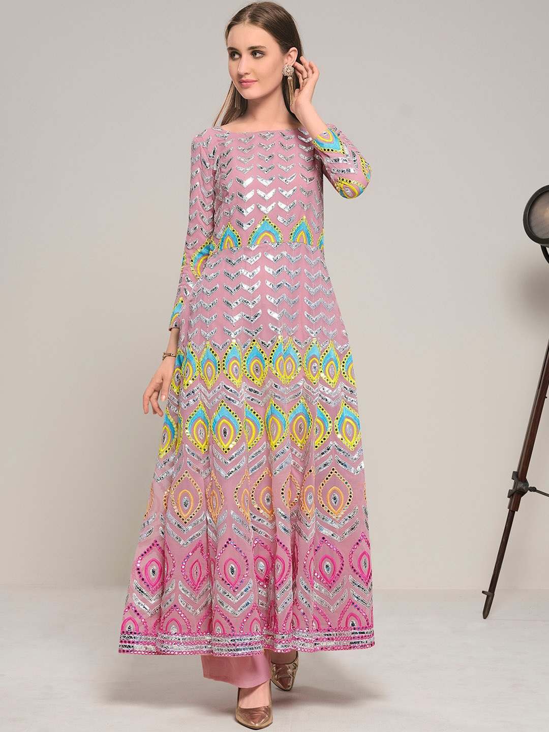 

DRESSTIVE Women Peach-Coloured Ethnic Motifs Embroidered Sequinned Kurta with Palazzos