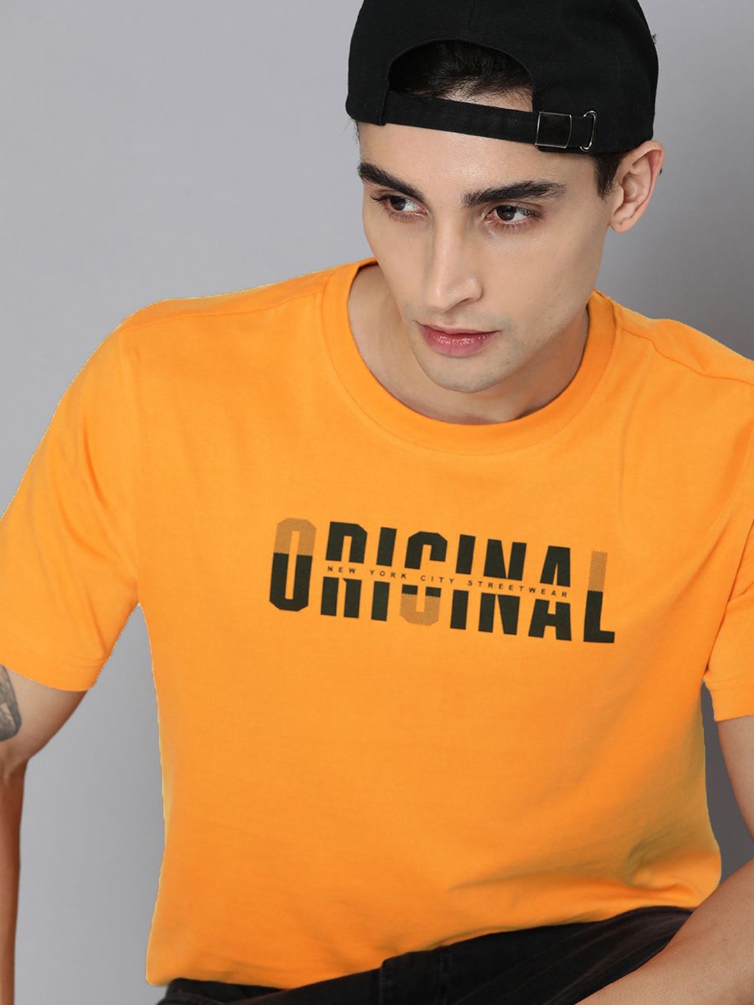 

HERE&NOW Men Mustard Yellow & Black Typography Printed Pure Cotton T-shirt