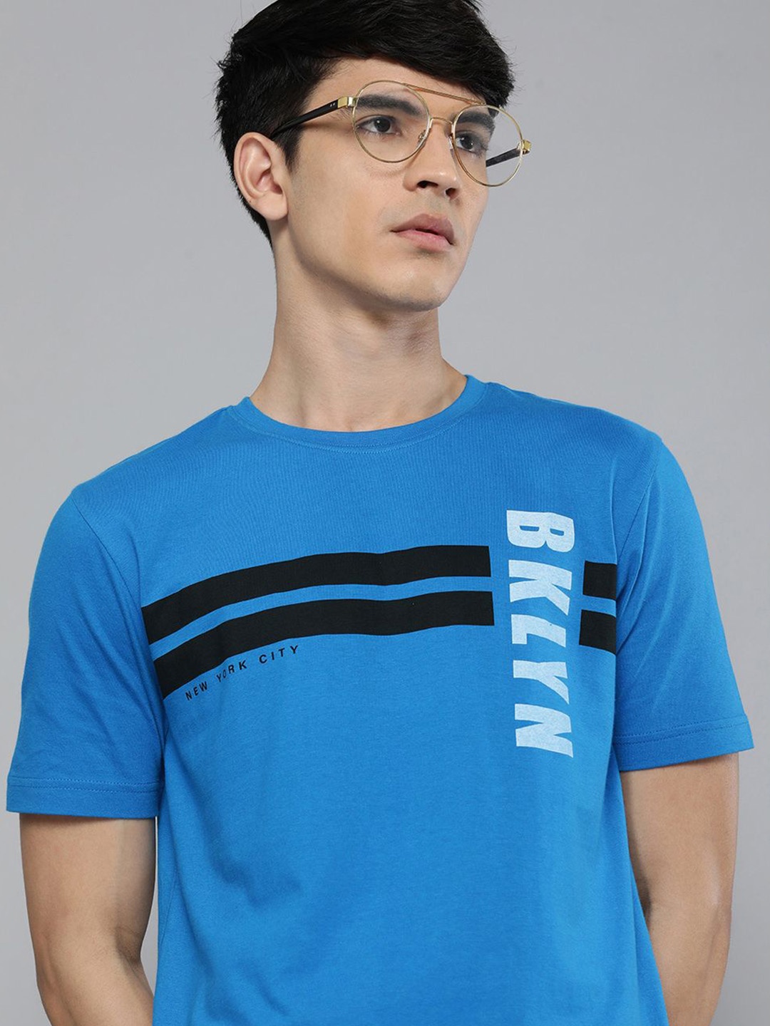 

HERE&NOW Men Blue & Black Typography Printed Pure Cotton T-shirt