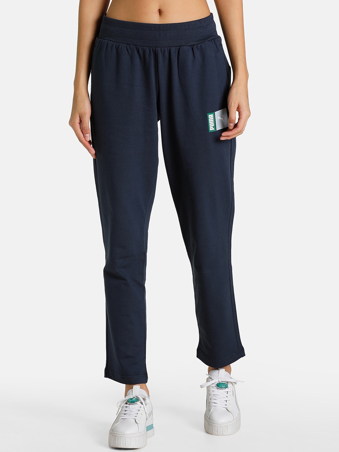 

Puma Women Blue Solid Cotton WMN Graphics lll Regular Fit Track Pants